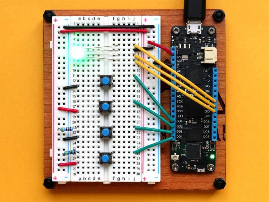 Photo of Meadow board connected to several push buttons and an RGB LED.