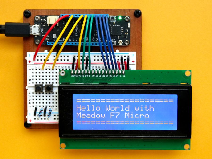 Photo of Meadow board connected to 20-by-4 LCD character display via a breadboard.