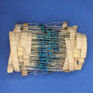 Photo of several end-taped bundles of resistors.
