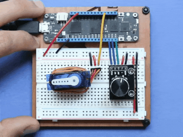 Video of a Meadow board connected to a rotary encoder controlling the position of a servo.
