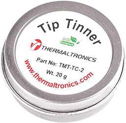 Photo of a metal split can containing tip tinner.