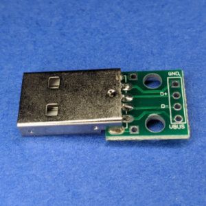 Photo of a USB breakout board, converting from a USB A male plug to the four USB pins.