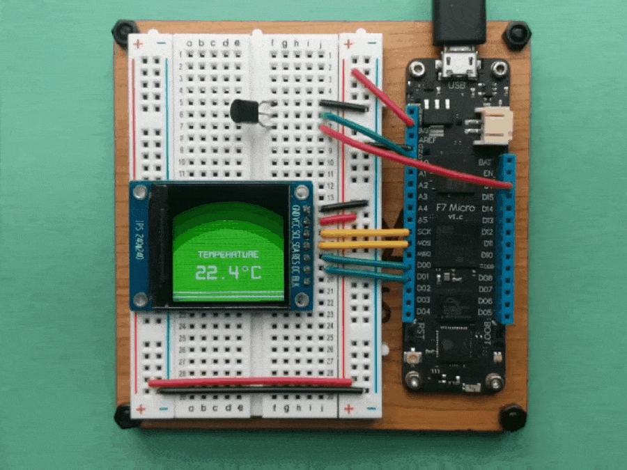 Video of a Meadow board connected to a temperature sensor and displaying the temperature on a display, going from 22.2 degrees Celsius to 22.4 degrees.