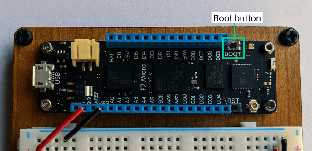 Meadow board with boot button labeled at the end of the header on the battery JST side of the board.
