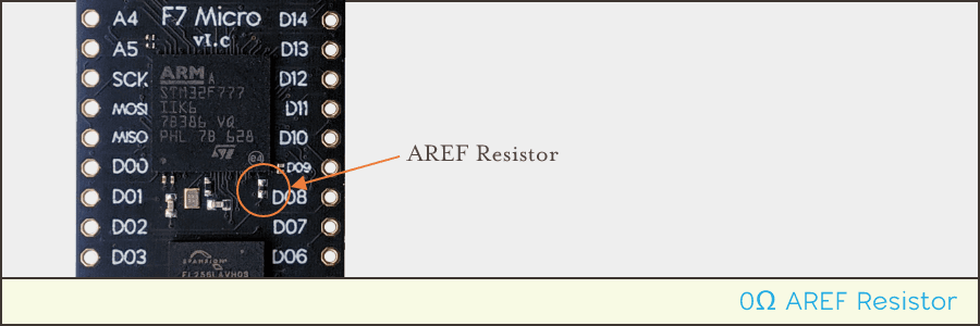 Photo displaying the location of the analog reference resistor, left of the board&#39;s D09 and D08 pin holes, below the ARM processor.